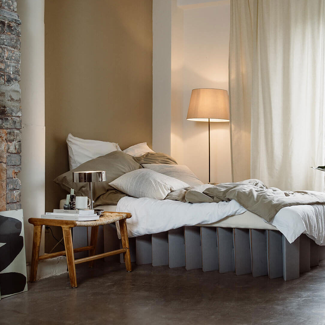 ROOM IN A BOX foldable Bed 2.0 made of cardboard in pebble grey