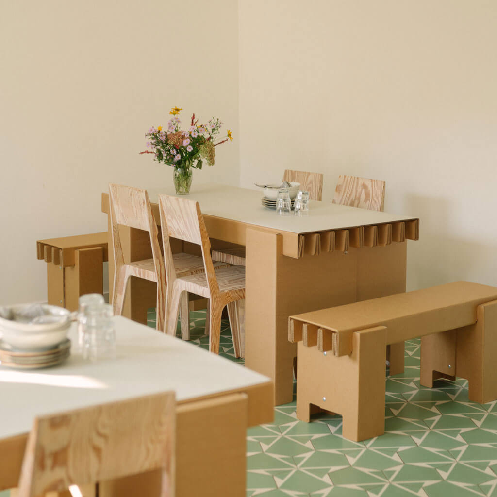 RIAB sustainable cardboard GRID bench at  dining table
