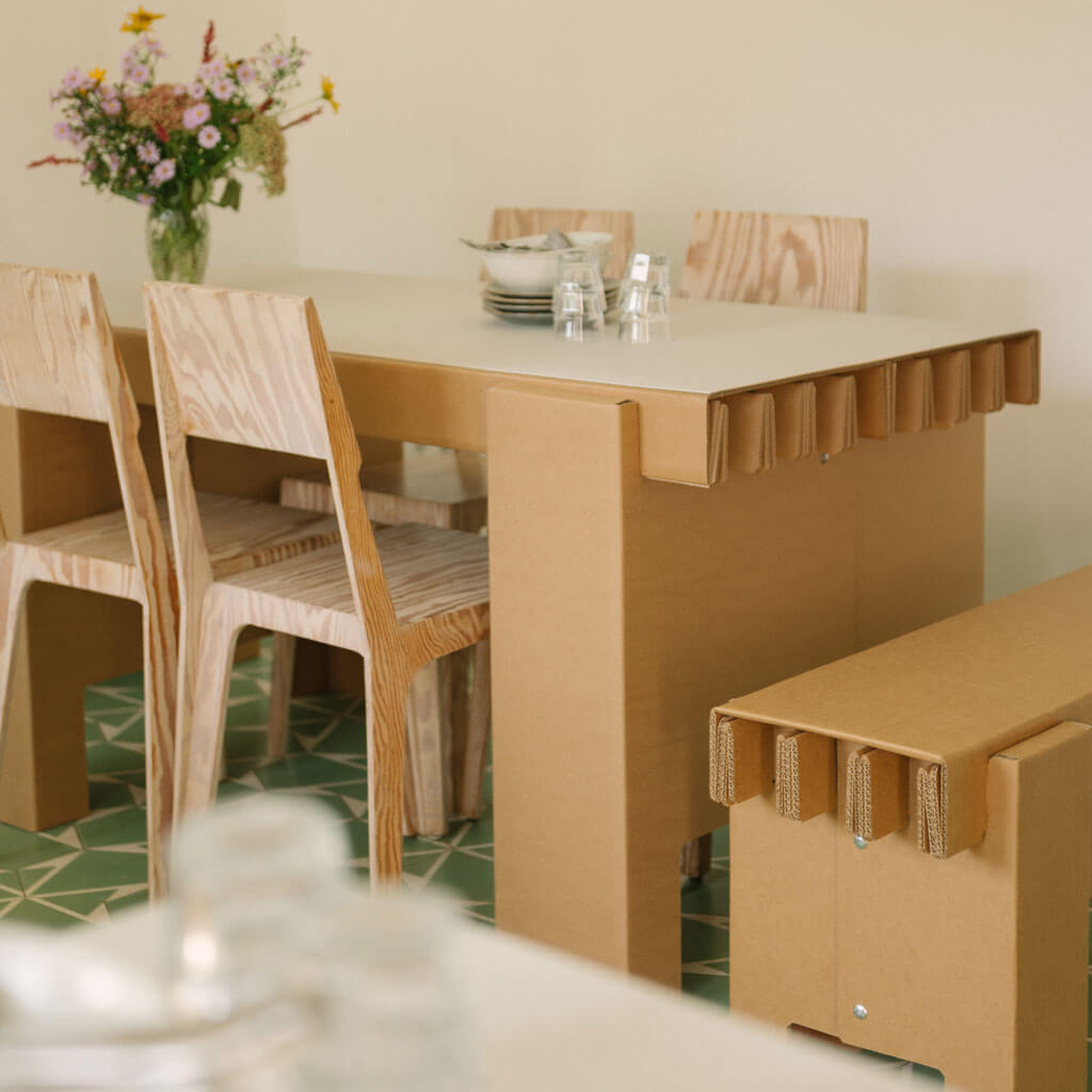 RIAB sustainable cardboard GRID bench at dining table