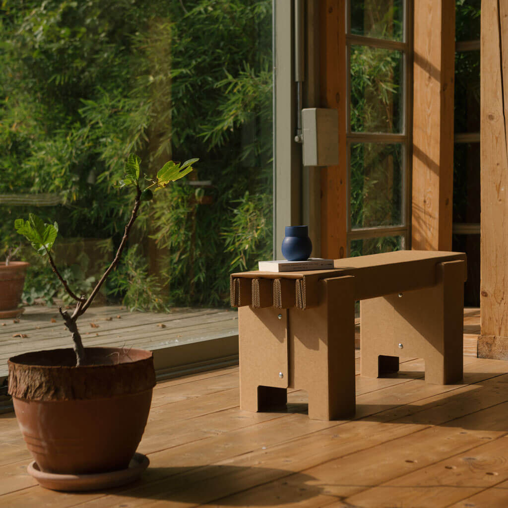 RIAB sustainable cardboard GRID bench near window