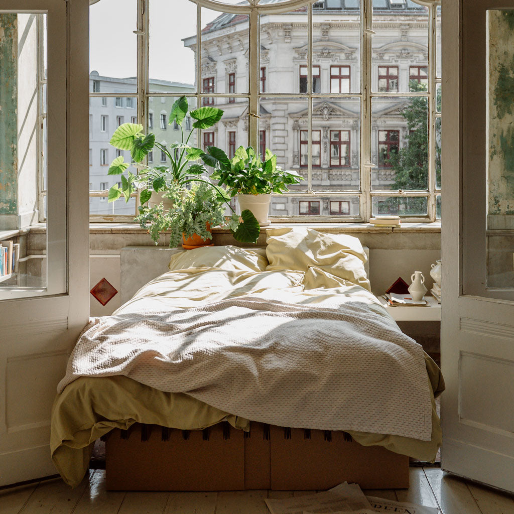 RIAB bedspread on GRID Bed in natural