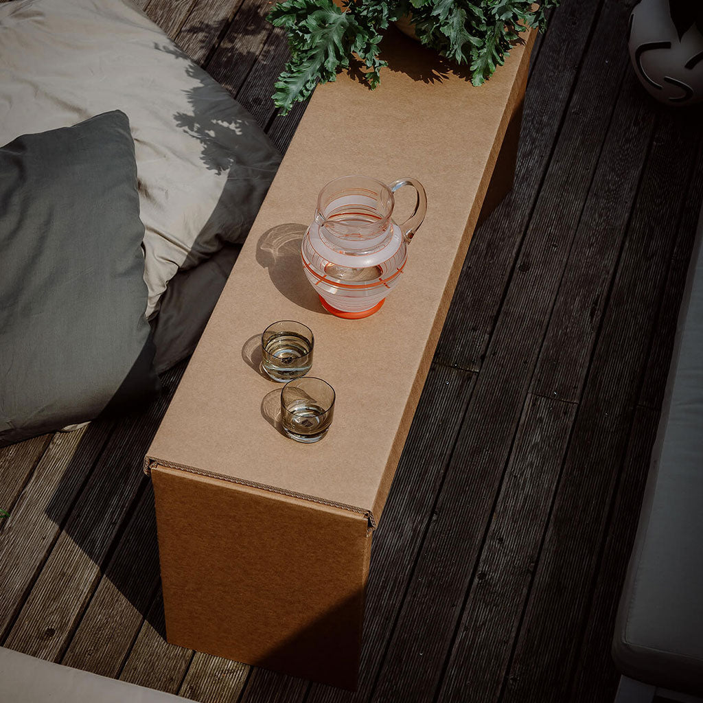 ROOM IN A BOX bench used as coffee table