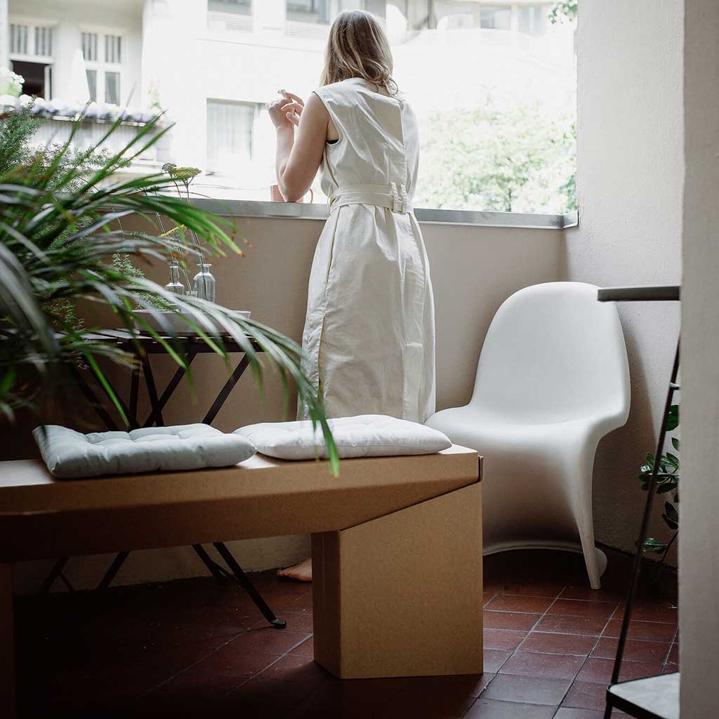 sustainable cardboard bench on the balcony