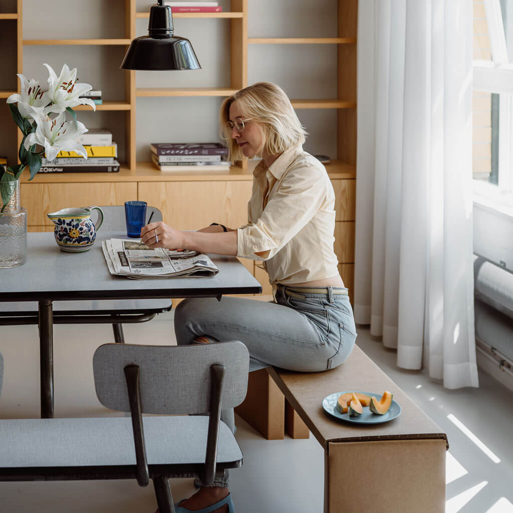 sustainable cardboard bench at dining table